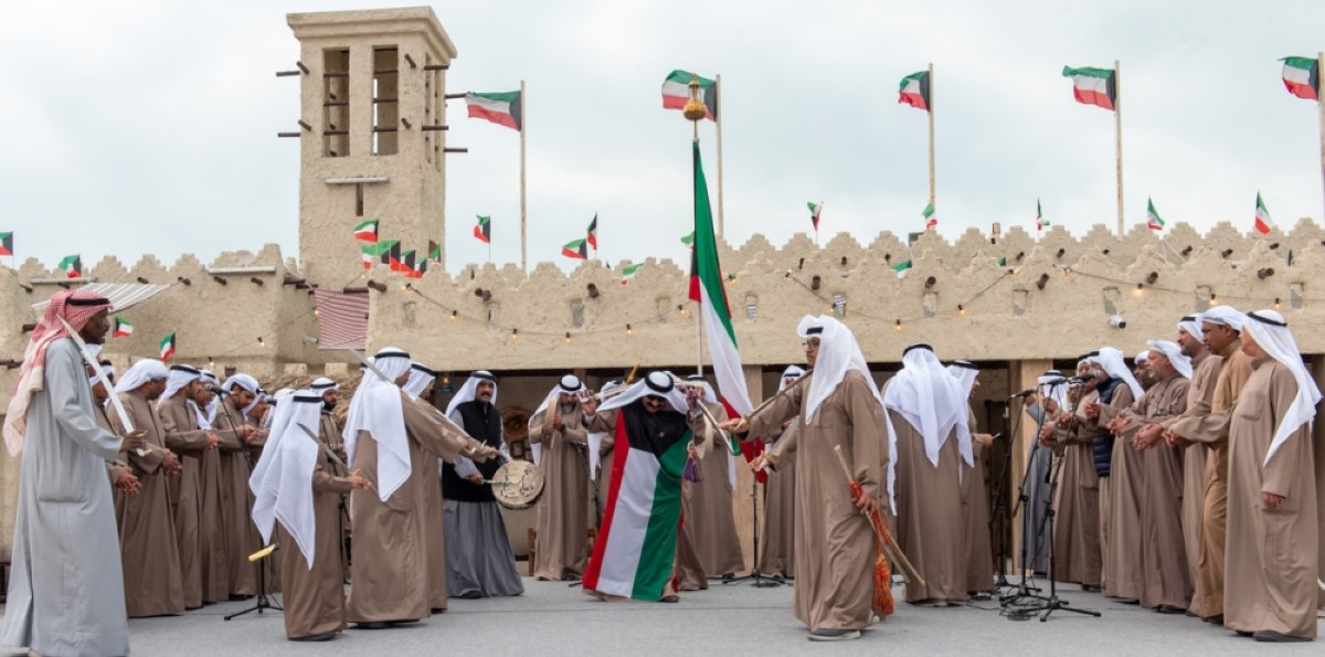 Kuwaiti folklore troupes performs the traditional Ardha dance at Youm Al-Bahar Village.