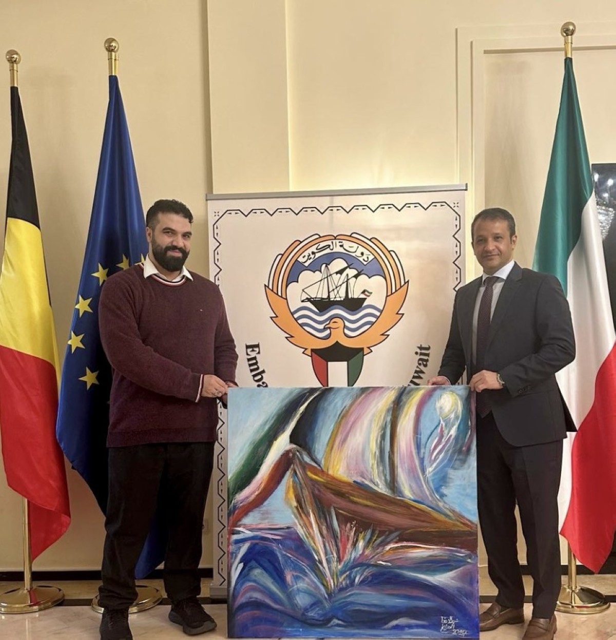 Kuwait’s Ambassador to Belgium Nawaf Nafie Al-Enezi (right) with visual artist Abdulredha Al-Saegh.