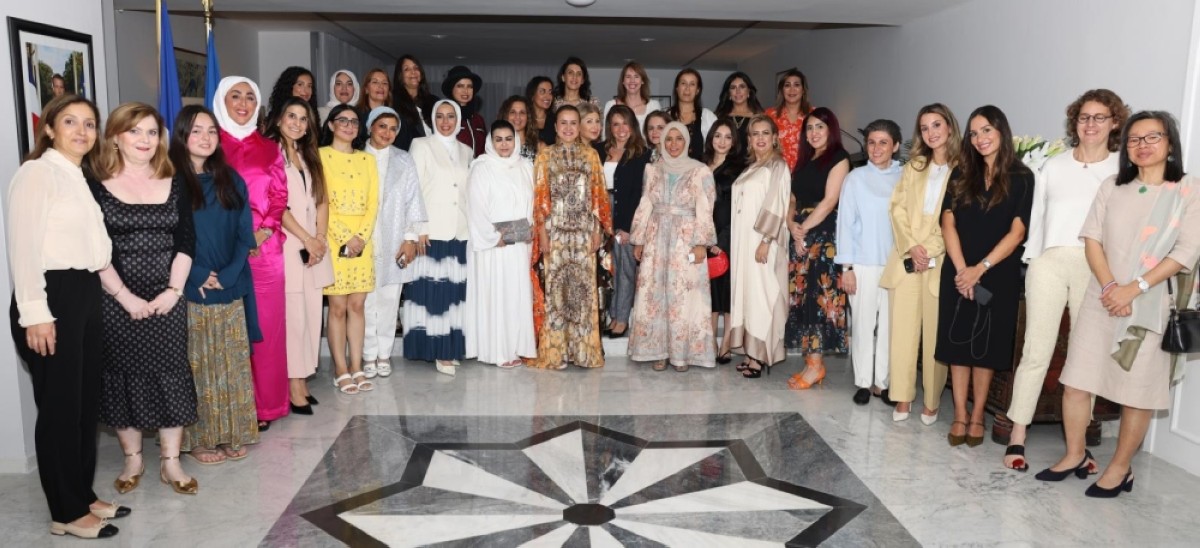 Ambassador of France to Kuwait Claire Le Flecher poses for a group photo at the diwaniya