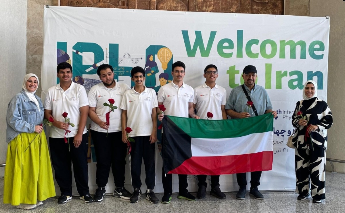 Students pose for a group photo. 
