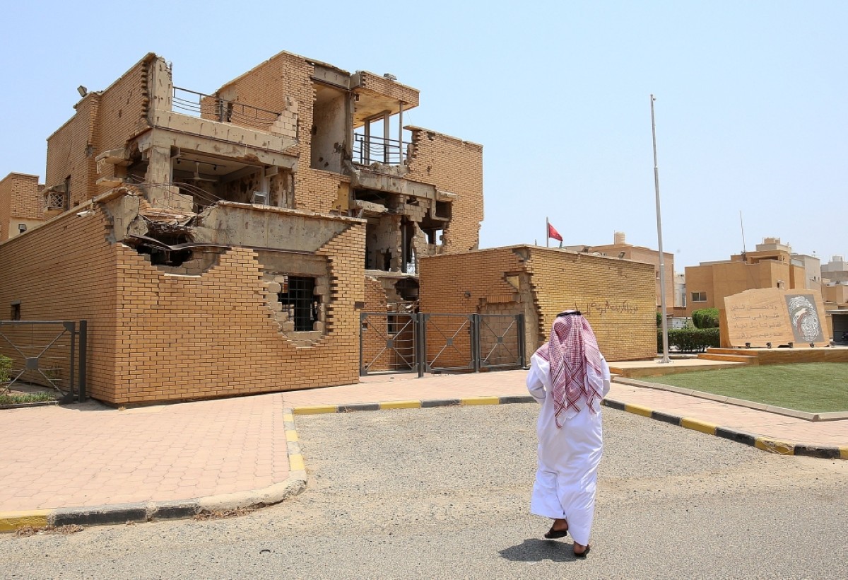 A man walks outside Al-Qurain Martyrs Museum, home to a battle which lasted 10 hours between invading Iraqi troops and a group of Kuwaiti fighters during the Iraqi occupation of Kuwait. - Photos by Yasser Al-Zayyat
