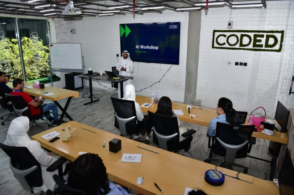 Nawaf Al-Mutairi, Instructor in CODED, speaks at the AI workshop. 