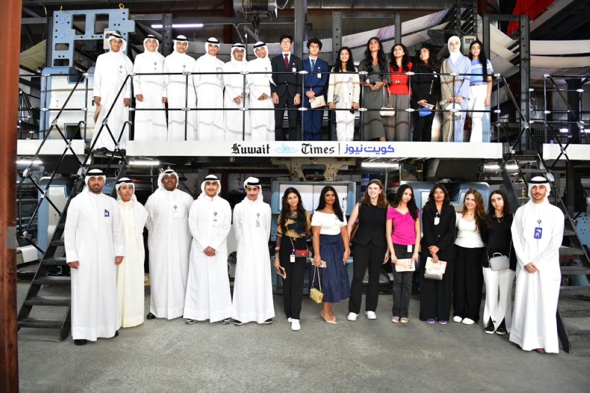 Group photo of NBK interns at Kuwait Times team.