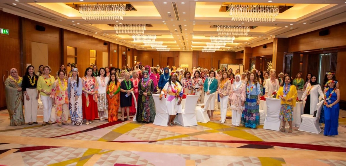 Attendees pose for a group photo. 