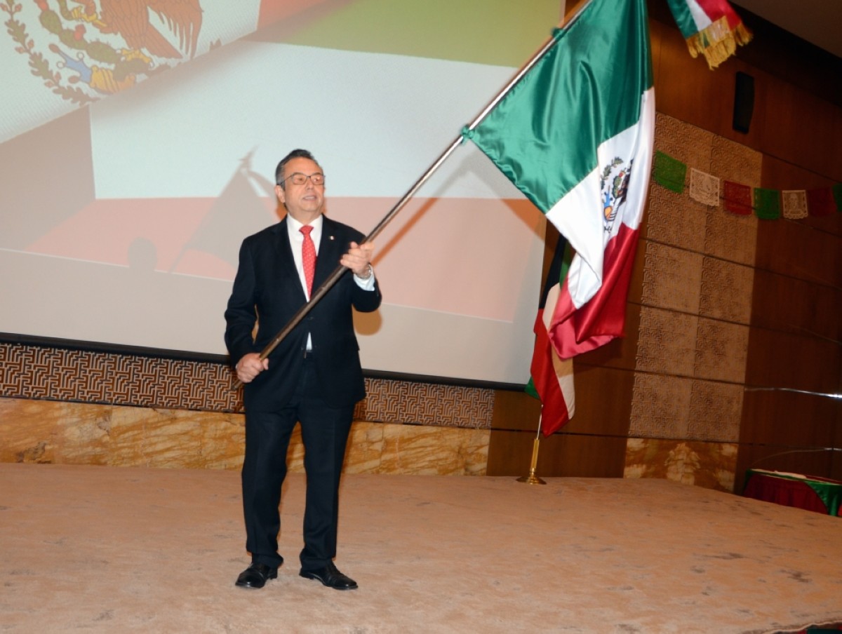 Mexican Ambassador Eduardo Pena Haller waves the Mexican&#039;s flag.
