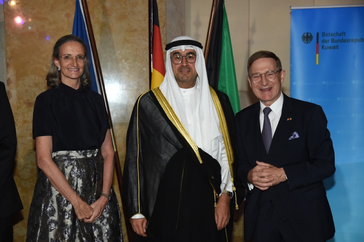 KUWAIT: German Ambassador to Kuwait Hans-Christian Freiherr von Reibnitz poses for a photo with Assistant Foreign Minister for European Affairs Sadiq Marafi and another guest at the event.