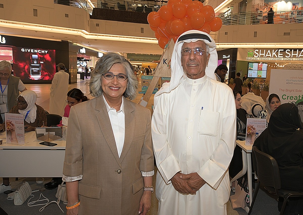Amal Al-Sayer and Dr Issa Al-Jassem pose for a photo.