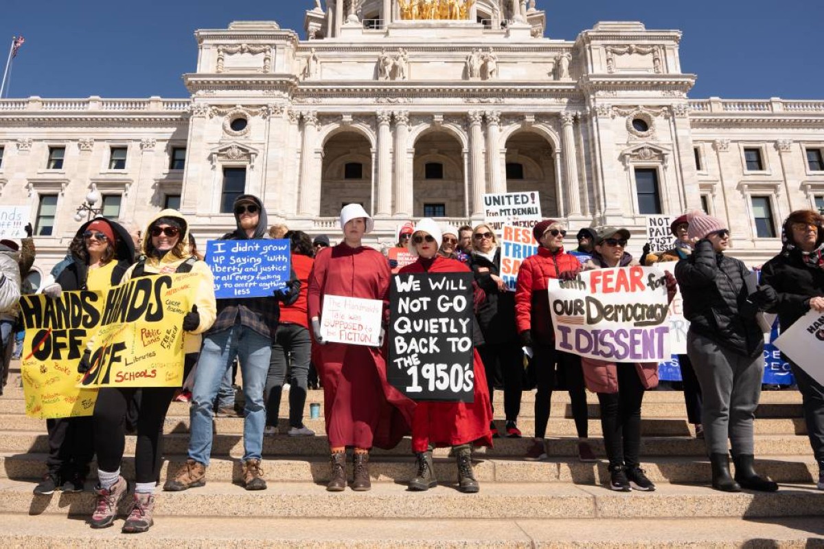 Demonstrators gather outside the Minnesota State Capitol during the nationwide "Hands Off!" protest in St Paul, Minnesota, on April 5, 2025. 