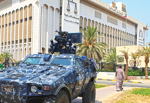 Kuwaiti special forces vehicle guard in front of the Kuwait's palace of justice in Kuwait City on August 4,2015.
