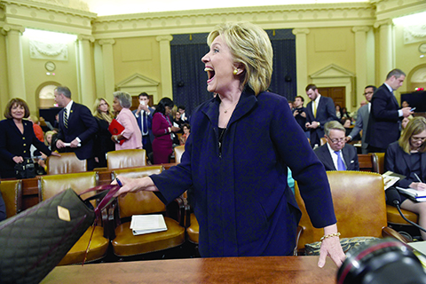 TOPSHOTSnFormer Secretary of State and Democratic Presidential hopeful Hillary Clinton testifies before the House Select Committee on Benghazi on Capitol Hill in Washington, DC, October 22, 2015. Clinton took the stand Thursday to defend her role in responding to deadly attacks on the US mission in Libya, as Republicans forged ahead with an inquiry criticized as partisan anti-Clinton propaganda.   AFP PHOTO / SAUL LOEB
