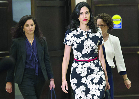 Huma Abedin, longtime aide to former US Secretary of State and Democratic presidential candidate Hillary Clinton, arrives to speak to the House Select Committee on Benghazi on Capitol Hill in Washington, DC, October 16, 2015. AFP PHOTO / SAUL LOEB