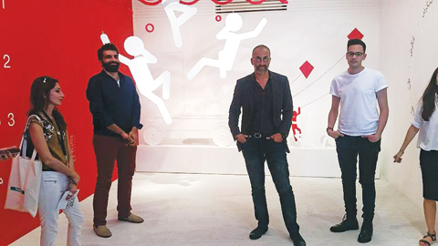 Curator Waleed Shaalan, second to the right, briefing visiting media at the Kuwait pavilion with designers Osama Hadeed, Liane Al-Ghusain and Abdulaziz Al-Kandary.