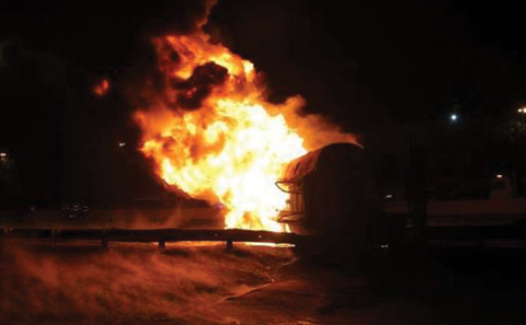 A gasoline transport truck engulfed in flames following at Sixth Ring Road yesterday.