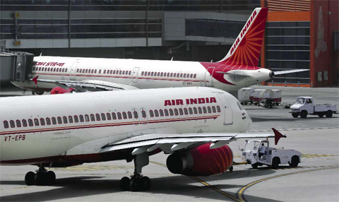 NEW DELHI: In this May 18, 2012 file photo, Air India planes are parked on the tarmac at the Terminal 3 of Indira Gandhi International Airport. - AP 