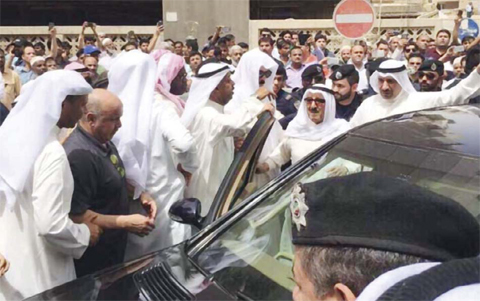 KUWAIT: His Highness the Amir arrives at the scene of the Imam Al-Sadeq Mosque shortly following a terrorist attack which left 26 worshippers dead and 227 others wounded. — KUNA photos