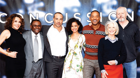 Co-producer giannina Facio-Scott, from left, dr Bennet omalu, director Peter Landesman, actor gugu Mbatha-Raw, actor Will Smith, producer elizabeth Cantillon and actor david Morse poses together at the photo call for ‘Concussion’ at The Crosby Street Hotel. — AP