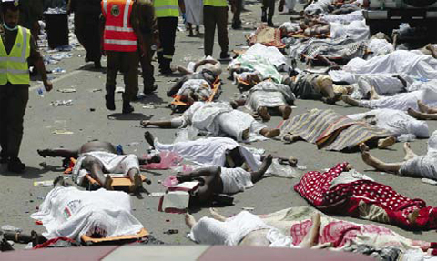 MINA: Bodies of people who died in Mina, Saudi Arabia during the annual hajj pilgrimage lie in a street. — AP