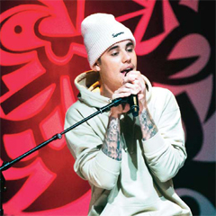 In this file photo Justin Bieber performs live during a small concert for charity in Toronto