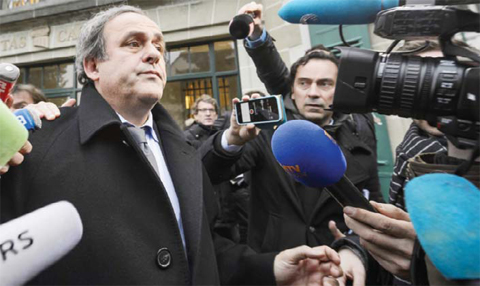 A photo shows UEFA president Michel Platini answering journalists’ questions upon his arrival to the Court of Arbitration for Sport (CAS) in Lausanne.