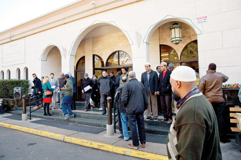 VIRGINIA: In this photo taken Dec 4, 2015, people arrive for Friday prayers at Dar Al-Hijrah Mosque in Falls Church. — AP