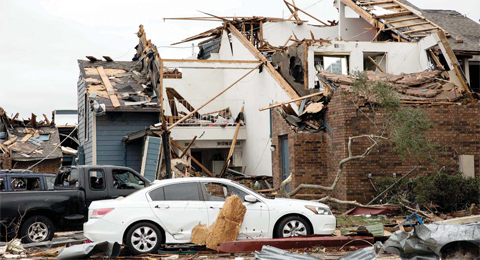 nnTEXAS: A destroyed apartment complex is seen in the aftermath of a tornado in Garland, Texas. The southern US state of Texas reeled from rare December tornados, as days of storms battering a vast region stretching from the southwestern US to Canada claimed at least 43 lives.  - AFP n