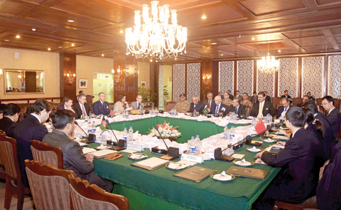 ISLAMABAD: In this photo released by Associated Press of Pakistan, delegates from Pakistan, Afghanistan, China and United States attend a meeting hoping to lay the roadmap for peace talks with the Taleban, at the foreign ministry. — AP