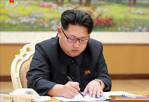 PYONGYANG: This picture taken from North Korean TV yesterday shows North Korean leader Kim Jong-Un signing a document of a hydrogen bomb test.  – AFP n