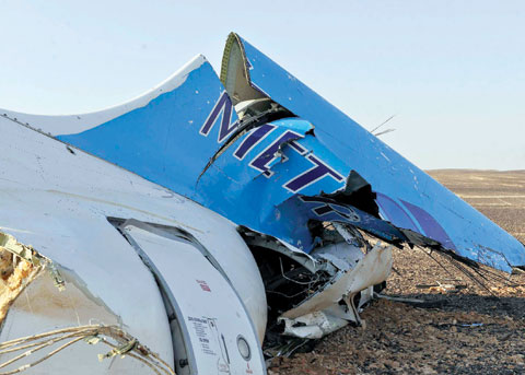 HASSANA: File photo shows the tail of a Metrojet plane that crashed in Hassana, Egypt. — AP