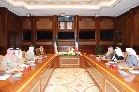 KUWAIT: HH the Amir Sheikh Sabah Al-Ahmad Al-Jaber Al-Sabah meets editors-in-chief of local dailies at Bayan Palace yesterday. — KUNA