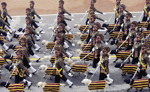NEW DELHI: Indian army’s dog squad march down Rajpath during the Republic Day parade in New Delhi yesterday. — AP