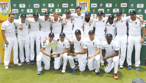 PRETORIA: England cricket team pose with trophy’s after winning the test series on the firth day of the fourth test cricket match between South Africa and England, at Centurion Park in Pretoria, South Africa, yesterday. South Africa beat England by 280 runs. — AP