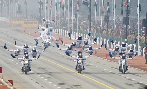 NEW DELHI: The motor cycle display team ‘Dare Devils’ of the Corps of Signals participate in India’s Republic Day parade in New Delhi yesterday. —AFP