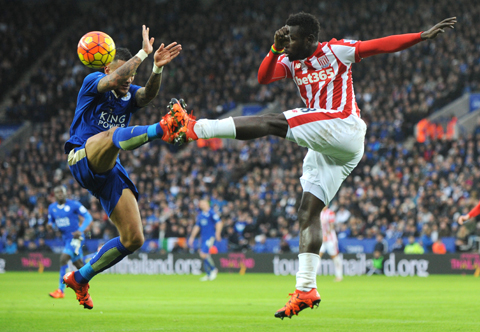 LEICESTER: Leicester's Danny Simpson (left) and Stoke's Mame Biram Diouf battle for the ball during the English Premier League soccer match between Leicester City and Stoke City at the King Power Stadium yesterday. - AP 