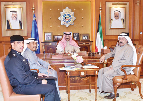 Deputy Prime Minister and Interior Minister Sheikh Mohammad Al-Khaled Al-Sabah meets with officials of the Ministry of Interior.—KUNA