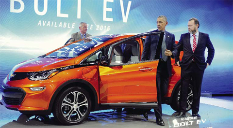 DETROIT: President Obama gets out of 2017 Chevrolet Bolt EV, an all-electric vehicle with an estimated range of 200 miles on a single charge, while touring the North American International Auto Show in Detroit. — AP photos