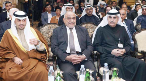 KUWAIT: Iraqi Oil Minister Adel Abdulmahdi (center), Kuwaiti Finance Minister and acting oil minister Anas Al-Saleh (left) and deputy chairman and CEO of Kuwait Petroleum Corporation Nizar Al-Adasani are seen at the Energy Strategy Forum yesterday. — Photo by Yasser Al-Zayyat