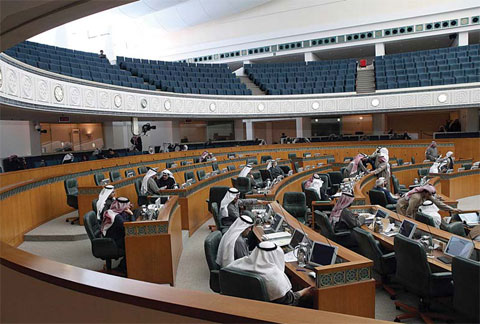 KUWAIT: MPs take part in a parliament session at the National Assembly in Kuwait City yesterday. —Photo by Yasser Al-Zayyat