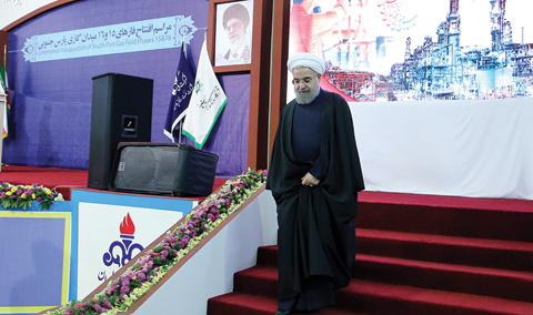 ASSALUYEH: A handout picture provided by the office of Iranian President Hassan Rouhani shows him attending the opening of the phase 15- 16 of the South Pars gas field facilities in the southern Iranian port town. — AFP