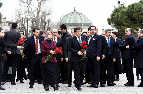 ISTANBUL: Turkish Prime Minister Ahmet Davutoglu (right) and his wife Sare Davutoglu arrive to place flowers in tribute to the victims at the site of yesterday’s attack in the city’s tourist hub of Sultanahmet. — AFP