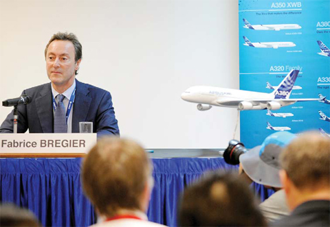 SINGAPORE: Airbus CEO Fabrice Bregier speaks to the media during a press conference at the Singapore Airshow at the Changi exhibition centre in Singapore yesterday. — AFP