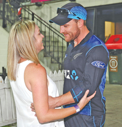 HAMILTON: New Zealand’s captain Brendon McCullum (R) with his wife Ellissa interact after the third one-day international cricket match between New Zealand and Australia at Seddon Park in Hamilton yesterday. — AFP