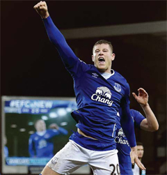 Everton’s English midfielder Ross Barkley celebrates scoring their second goal from the penalty spot during the English Premier League football match between Everton and Newcastle United at Goodison Park. — AFP