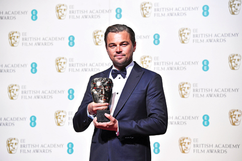 US actor Leonardo DiCaprio poses with the award for a leading actor for his work on the film ‘The Revenant’.