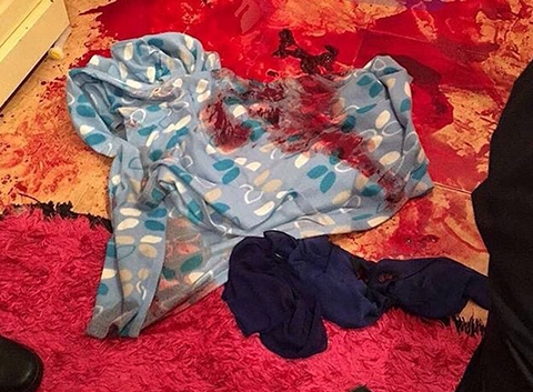 Blood-stained clothes found in the crime scene.
