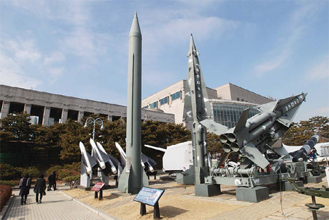 SEOUL: A mock Scud-B missile of North Korea (left) and other South Korean missiles are displayed at the Korea War Memorial Museum in Seoul, South Korea yesterday. South Korea warned yesterday of ‘searing’ consequences if North Korea doesn’t abandon plans to launch a long-range rocket that critics call a banned test of ballistic missile technology. —AP