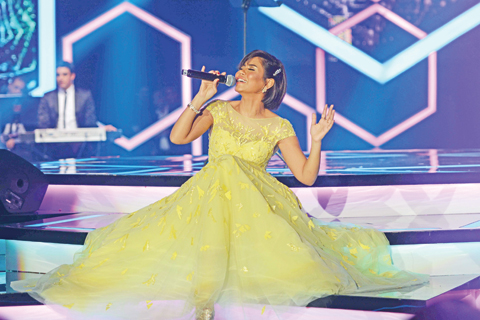 Photo shows Shireen perform on stage