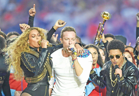 Beyonce, Chris Martin and Bruno Mars perform during Super Bowl 50.