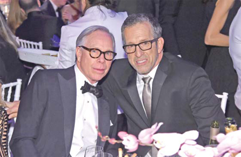 Tommy Hilfiger (left) and Kenneth Cole attend the 2016 amfAR New York Gala at Cipriani Wall Street on February 10, 2016 in New York City. — AFP