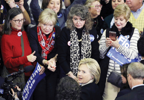 HOOKSETT: Democratic presidential candidate Hillary Clinton mingles with supporters at her New Hampshire presidential primary campaign rally. – AP 