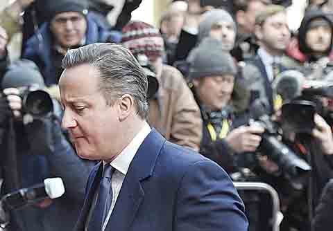 British Prime Minister David Cameron arrives for an EU summit at the EU Council building in Brussels on Friday, Feb. 19, 2016. Cameron faces tough new talks with European partners after through-the-night meetings failed to make much progress on his demands for a less intrusive European Union.  (AP Photo/Martin Meissner)